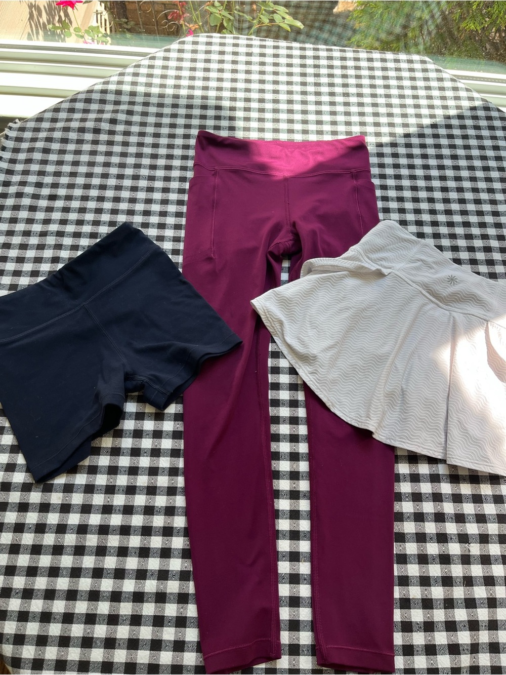 Athleta Plum Leggings with Navy Shorts & Cream Skort (three items)